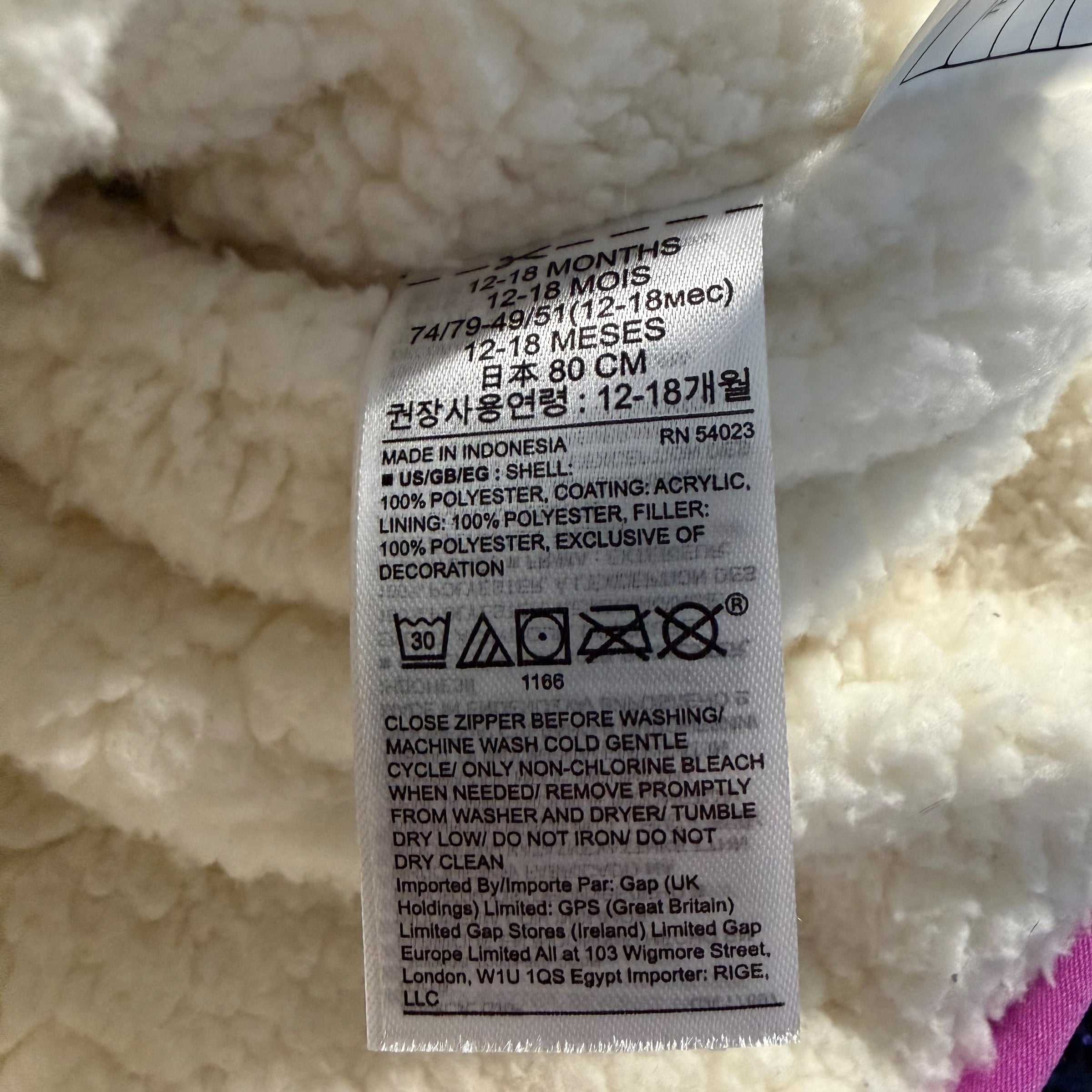 Baby GAP floral-patterned puffer jacket with pink zipper 12-18 months